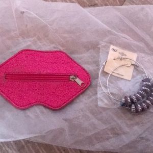 Lip pouch with hoop earrings